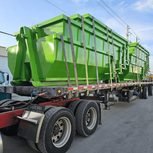 The Dumpsters Back to Life team gathered in front of a roll-off dumpster, showcasing their dedication and expertise.